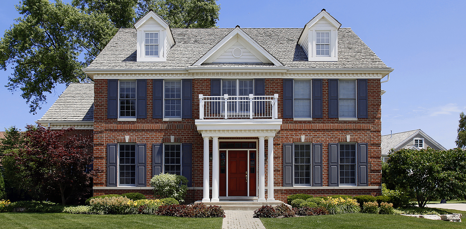 Brick colonial house seen during a home inspection